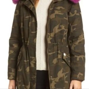 Madison luxe jacket. Camo with dark pink and black fur hood Like new size med.